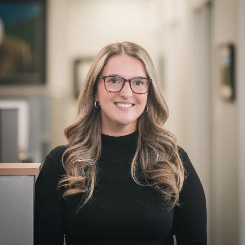 Lesley Jenkins, Partner at JMG Accounting pictured here smiling in the office